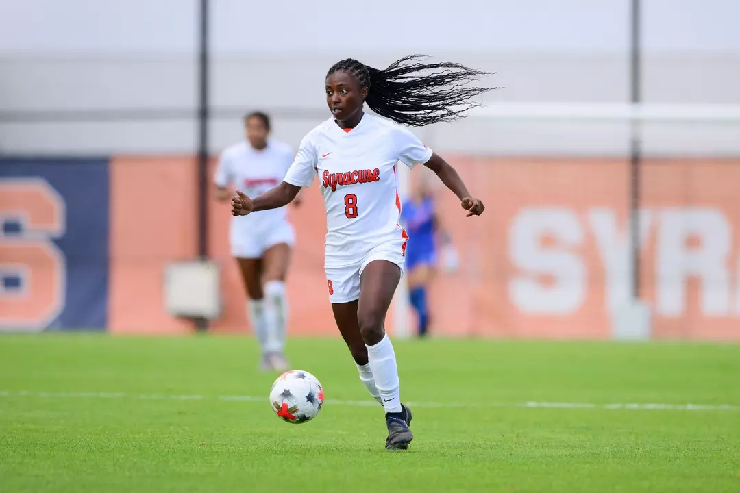 Chloe Joseph dribbles up the field