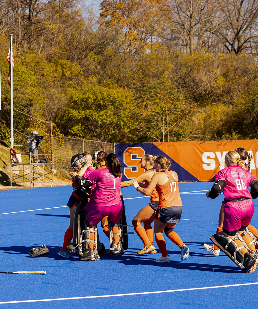 Syracuse field hockey celebrates a shootout win over Cal