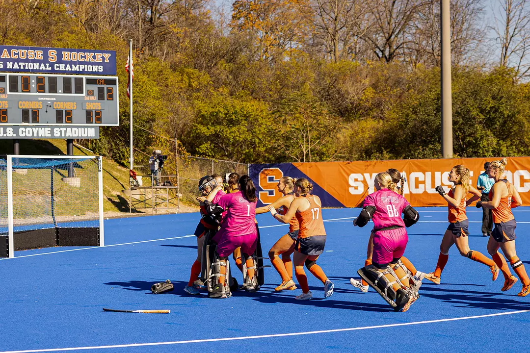 Syracuse field hockey celebrates a shootout win over Cal
