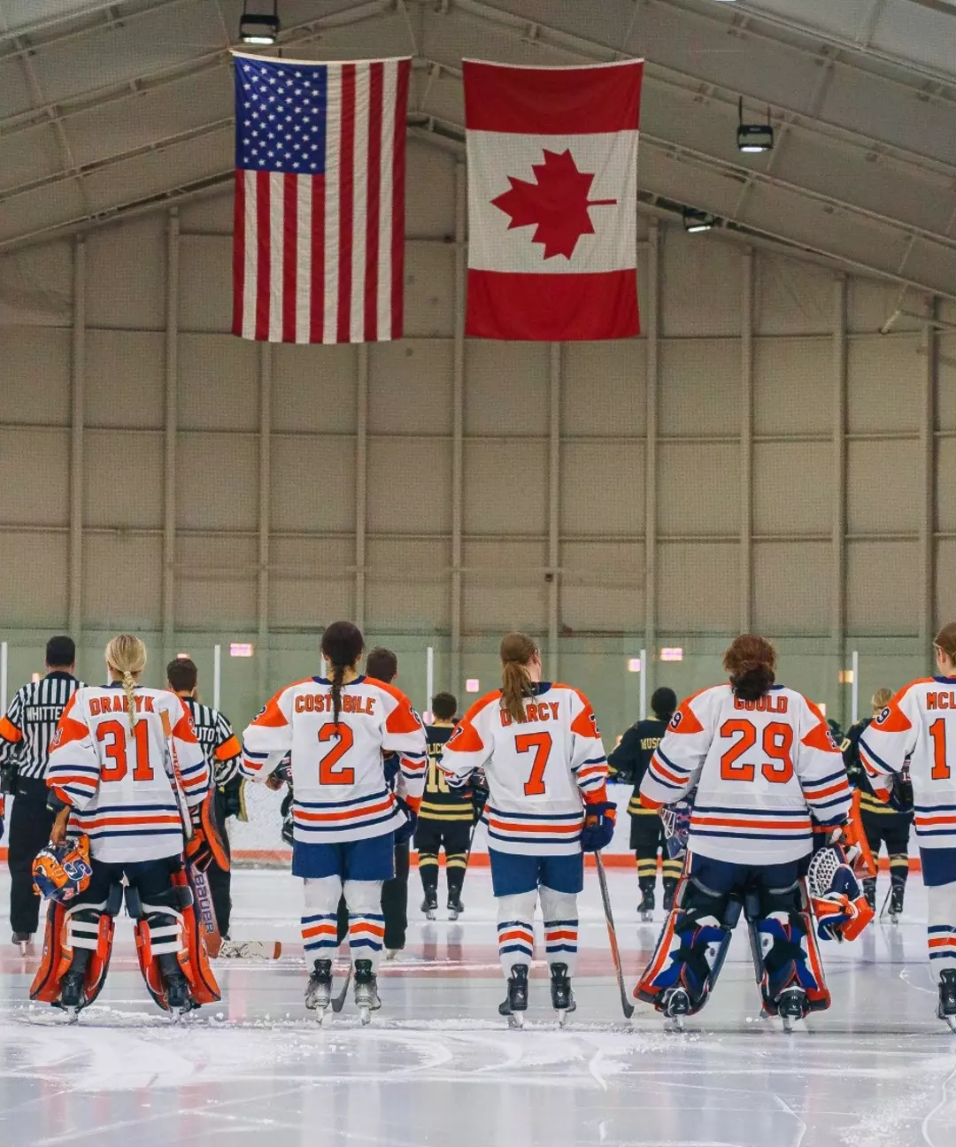 Ice Hockey team standing on Blue Line