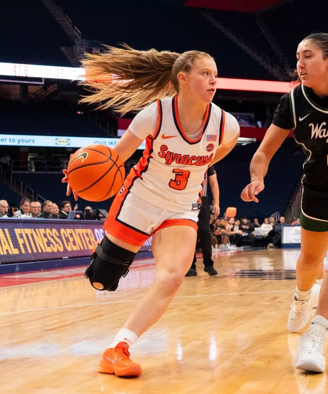 Liv Schmitt driving through to the paint