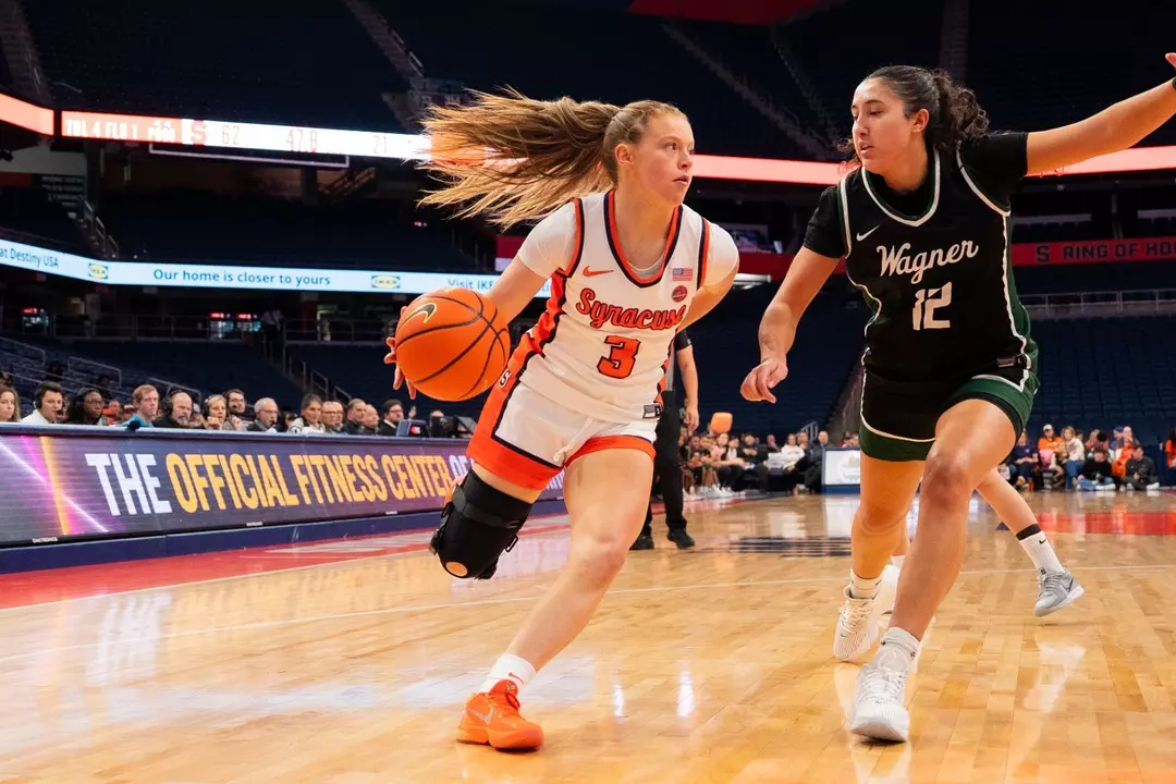 Liv Schmitt driving through to the paint