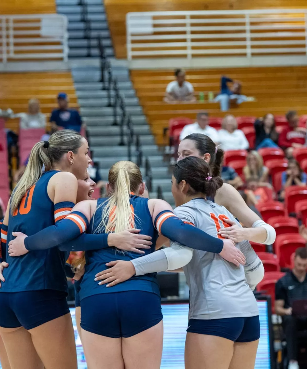 Volleyball Team Huddle vs. Cornell
