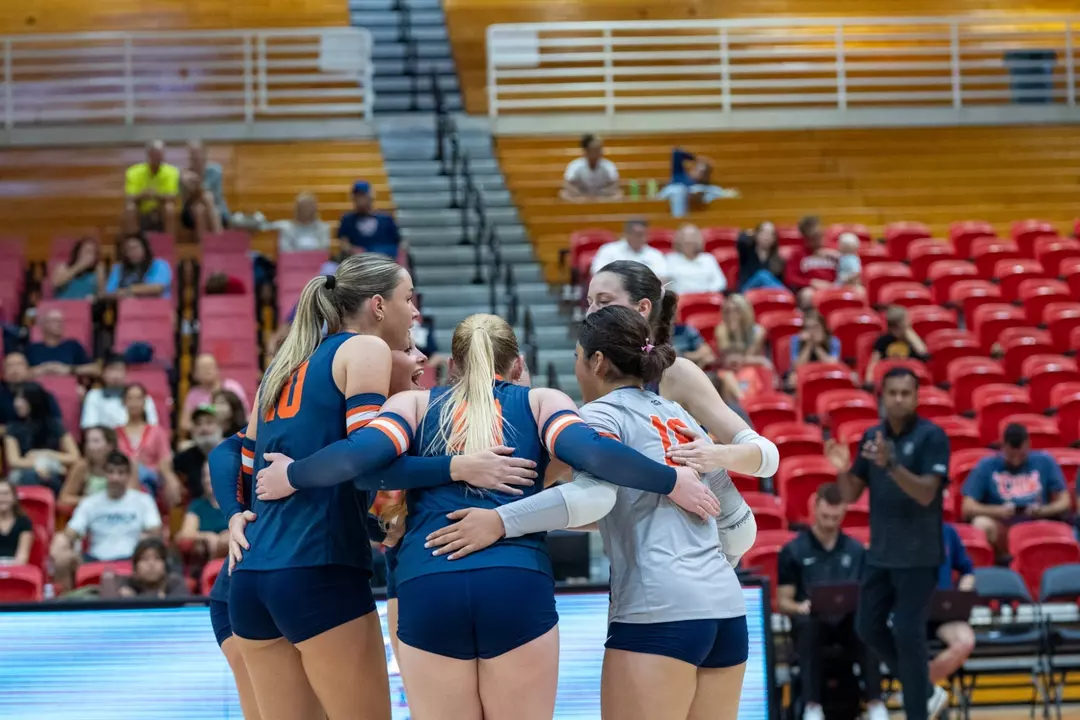 Volleyball Team Huddle vs. Cornell