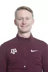 Brady Grant during track and field headshot day in College Station, TX.