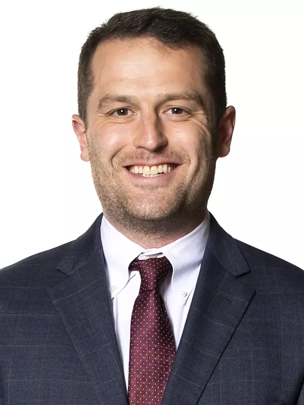 COLLEGE STATION, TX - October 25, 2022 - Head Coach Buzz Williams of the Texas A&M Aggies and Assistant Coach Lyle Wolf of the Texas A&M Aggies during Texas A&M Aggies Men's Basketball photo day in College Station, TX. Photo By Craig Bisacre/Texas A&M Athletics