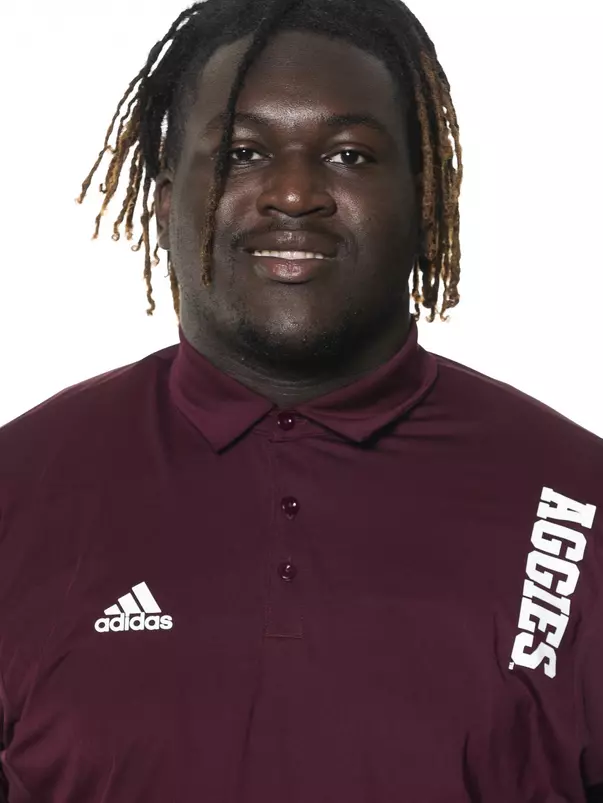 COLLEGE STATION, TX - June 02, 2022 - Kam Dewberry during football headshots in College Station, TX. Photo By Brendall O'Banon/Texas A&M Athletics