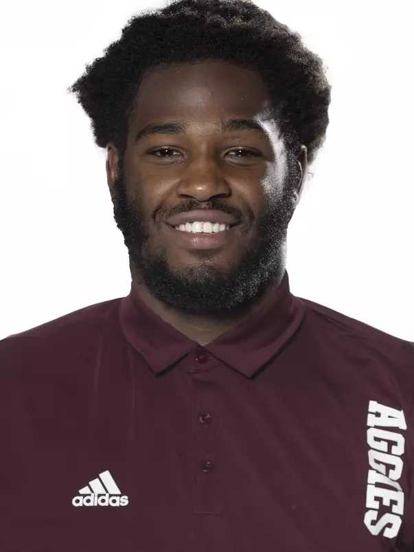 Enai White Head Shot