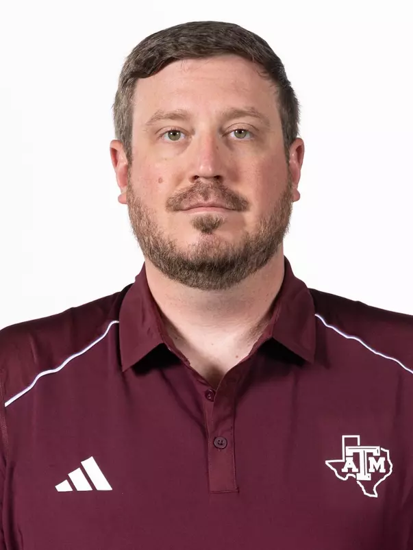 COLLEGE STATION, TX - May 31, 2024 - 
Wes Foltz of the Texas A&M Aggies during Texas A&M Aggies Swimming & Diving coaching staff portraits at Kyle Field in College Station, TX. Photo By Aiden Shertzer/Texas A&M Athletics