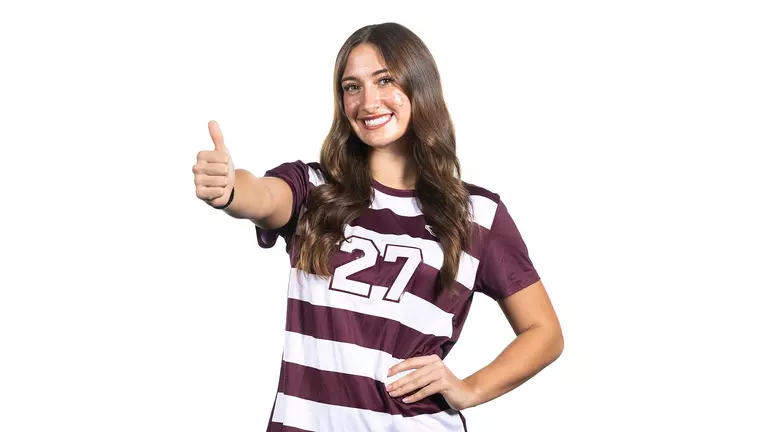 Hayden Wilson recruiting visit portrait shoot flashing a Gig 'em