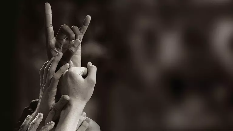 Texas Traditions: Hook ‘em, Horns