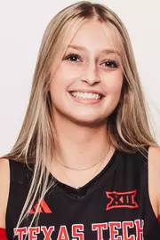 Ava Johnson in a black uniform posing for a headshot.