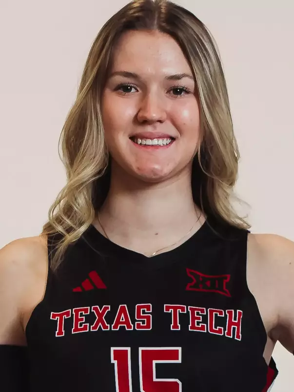 Kayla Robertson in a black uniform posing for a headshot.