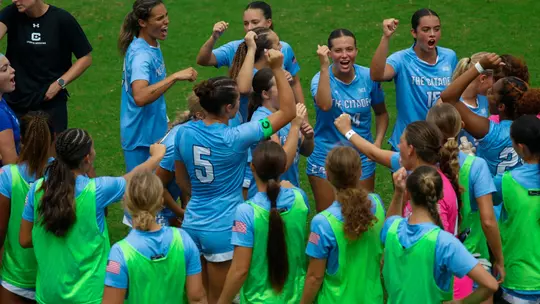 Soccer Team Huddle