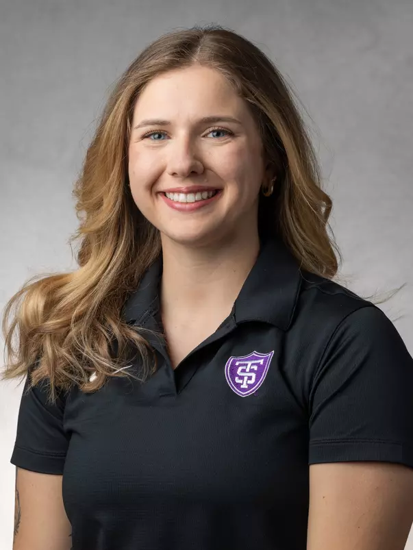 Studio portrait of Ellen Parkey, Assistant Director of Strength and Conditioning, taken in the OEC photo studio on April 08, 2026 in St. Paul.