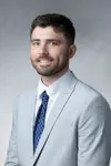 Studio portrait of Riley Miller, Assistant Coach, taken in the OEC Photo Studio on July 07, 2026 in St. Paul.