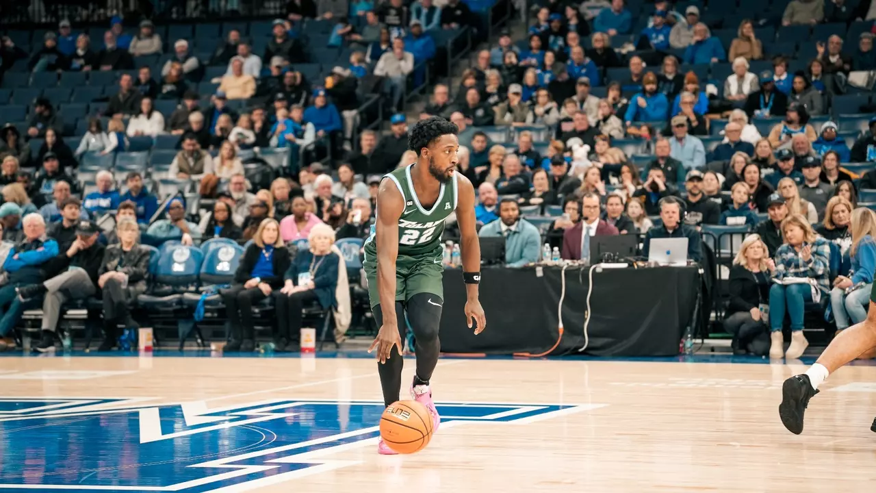 Asher Woods sets up the offense against Memphis in FedEx Forum.