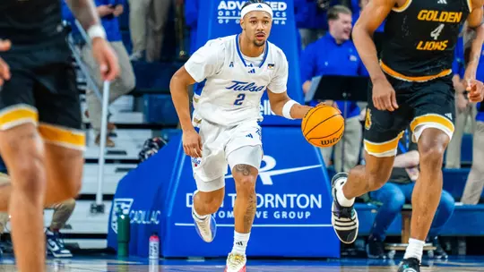 Jaylen Lawal dribbles up the court against UAPB