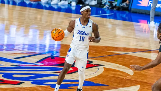 Tylen Riley looks to drive against UAPB