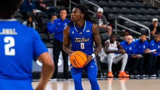 Ade Popoola looks to shoot against San Jose State