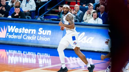 David Green jogs up the floor against USF