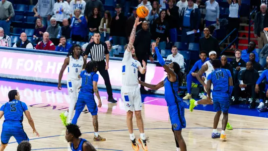 Tyler Behrend attempts a shot against Memphis