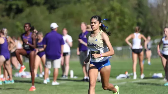 Kathryn Koonts runs at the Gans Creek Classic