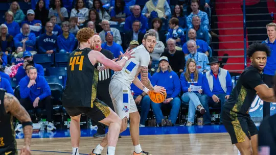 Tyler Behrend looks to pass against Wichita State