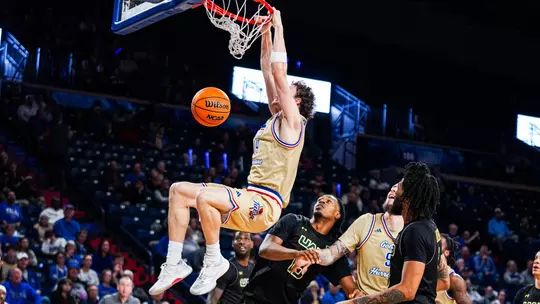 Miles Barnstable throws down a dunk against UAB