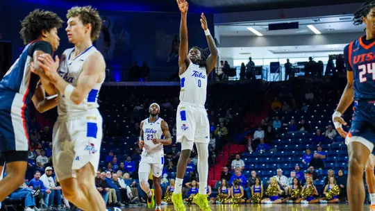 Ade Popoola shoots a three against UTSA
