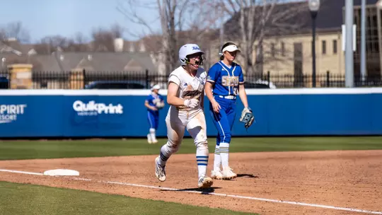 Amber Turner jogs home to score the winning run against SDSU