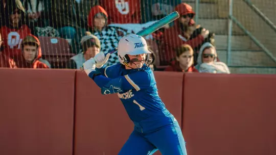 Maci Cole at the plate against Oklahoma