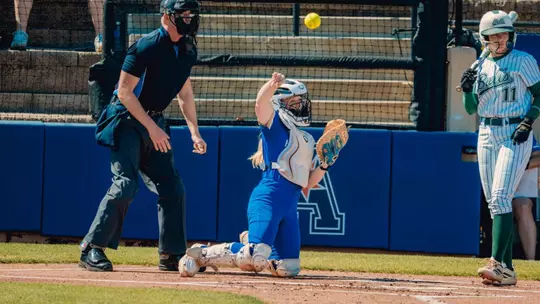 Amber Turner throws the ball back to the pitcher against South Florida