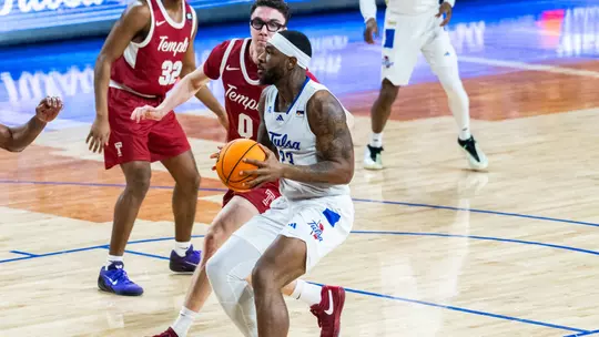 David Green drives to the basket against Temple