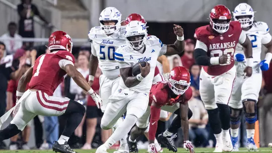 Dexter Williams II scrambles against Arkansas
