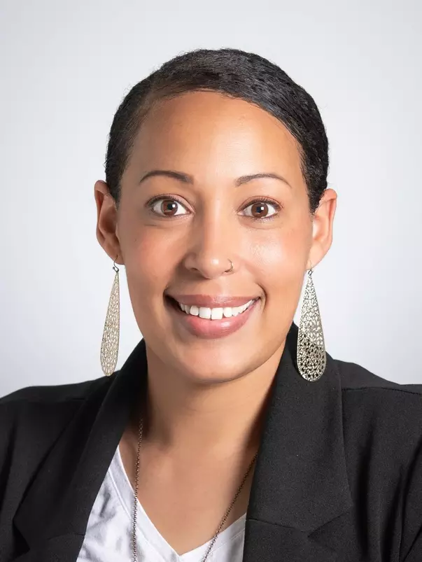 Headshot of A'dja Jones (Associate Athletics Director - Student-Athlete Support Services), June 2024.