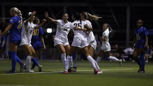 Ariane Haysman Boaler celebrates her game-winner with her teammates in a 2026 match at UC Riverside