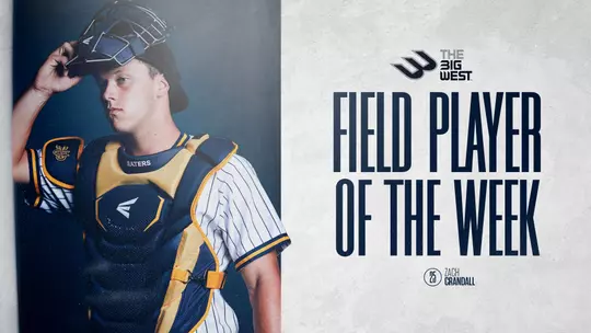 Catcher Zach Crandall poses with the words Big West Field Player of the Week on the graphic with him