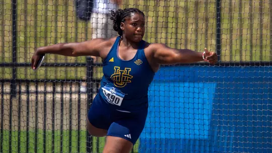 Nyla Baker throws the discus at the NCAA West First Round meet