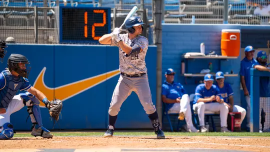Auggie Gutierrez stands in the box awaiting the pitch in a game at UC Riverside as shot by Elena Versage of UC RIverside Athletics