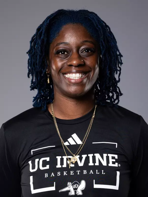 Zykera Rice in a black long sleeve shirt with UC Irvine basketball and an Anteater logo