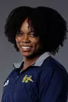 Head shot of Gail Usher in a blue quarter zip with the BC Anteater logo.