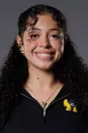 Head shot of Naomi Hunt in a black quarter zip with the BC Anteater logo.