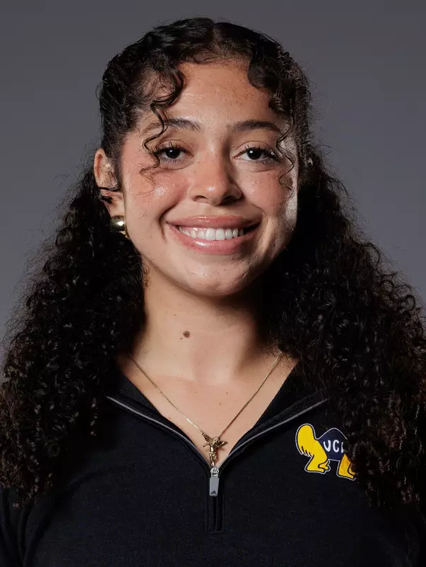 Head shot of Naomi Hunt in a black quarter zip with the BC Anteater logo.