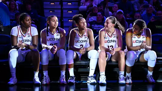 UNCASVILLE, Conn - October 13 - guard Azzi Fudd #35, guard Kk Arnold #2, forward Sarah Strong #21, guard Ashlynn Shade #12, forward Serah Williams #22 of the UConn Huskies against the Boston College Eagles at Mohegan Sun Arena in Uncasville, CT. Photo by Simon Asher