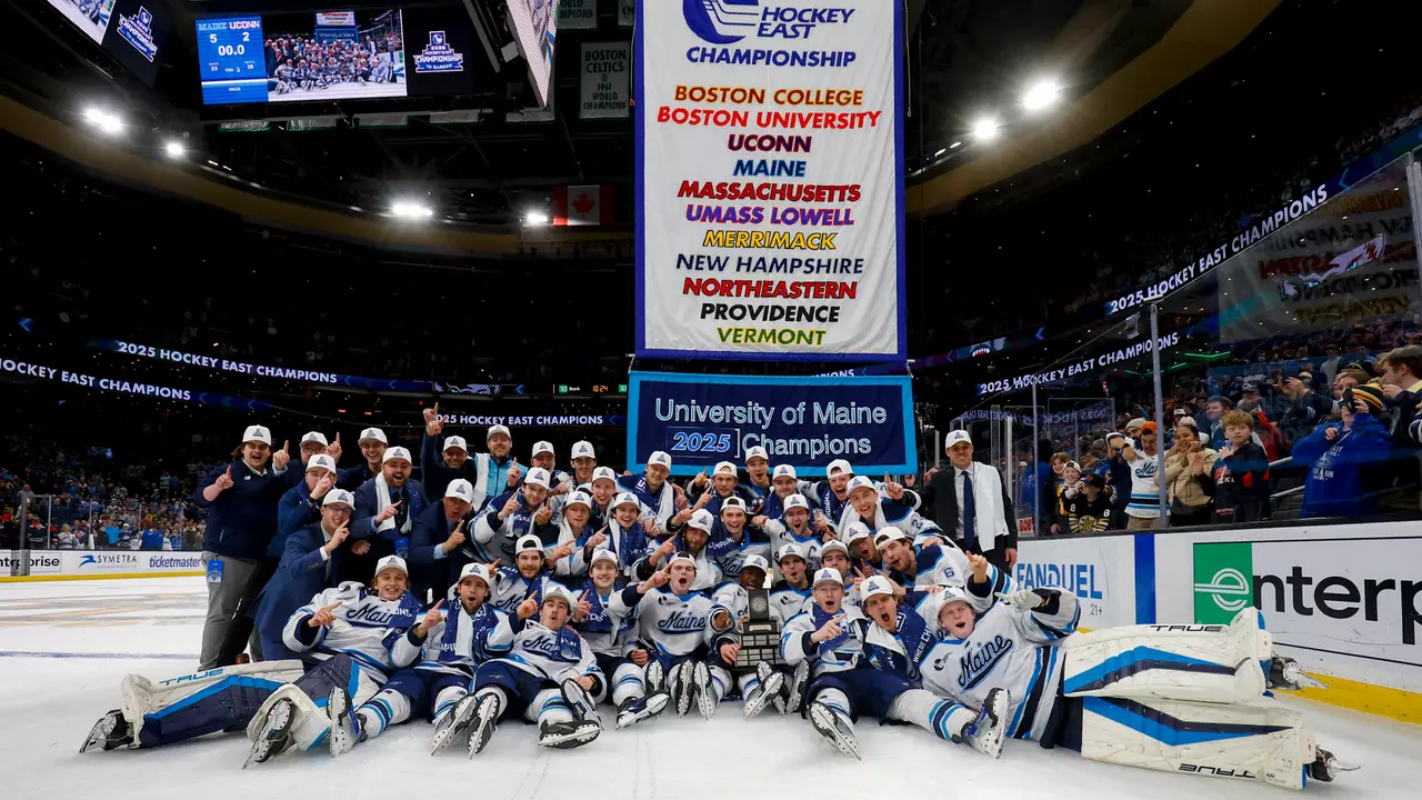 Maine men's hockey celebrates a Hockey East title.