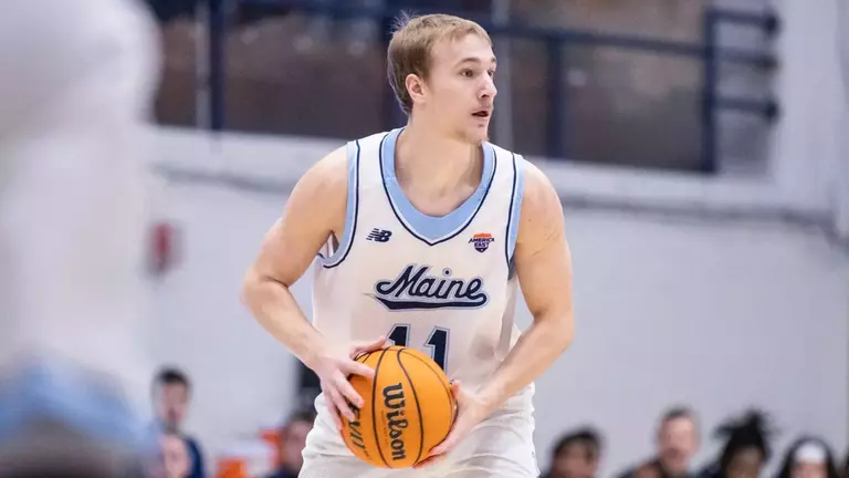 Ace Flagg looking to pass against Binghamton
