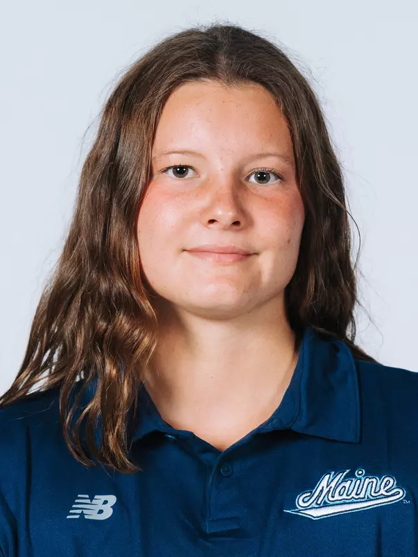 Headshot of women's swimmer wearing blue polo