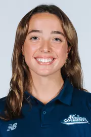 Headshot of women's swimmer wearing blue polo