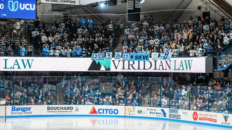 A wide shot of the Alfond Arena student section before a game.